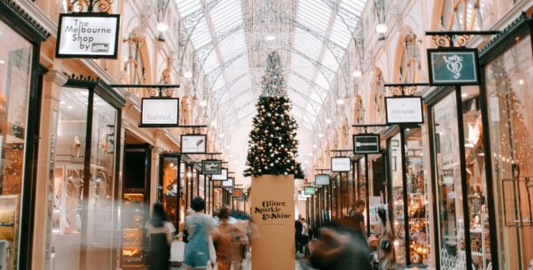 A shopping arcade decorated with a Christmas tree