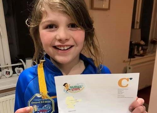 Image of Amelie and her certificate