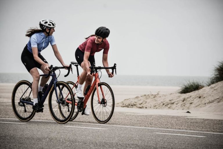 Image of two people cycling