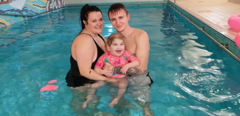 Maisy-Leigh and family in the pool at Chestnut Tree House