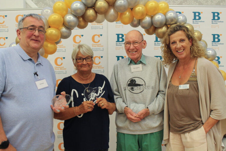 Image of our three volunteer winners and Sally Gunnell