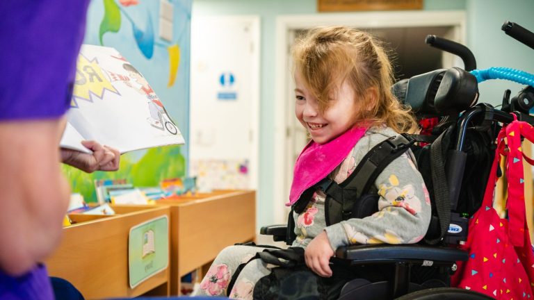 Reading books with a big smile!