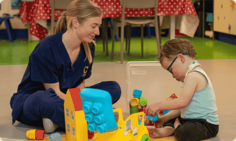 Image of Beau and healthcare worker