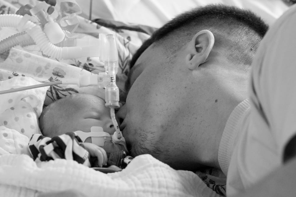 Owen kissing baby Loui