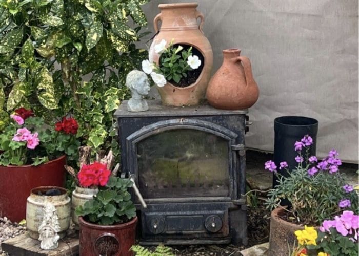 Potted plants and a stove at pinks garden, taking part in our open gardens event